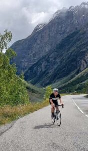 Callum Wrathall on a bike, on a hill